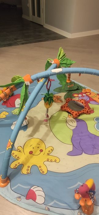 Розвиваючий килимок фірми Tiny Love