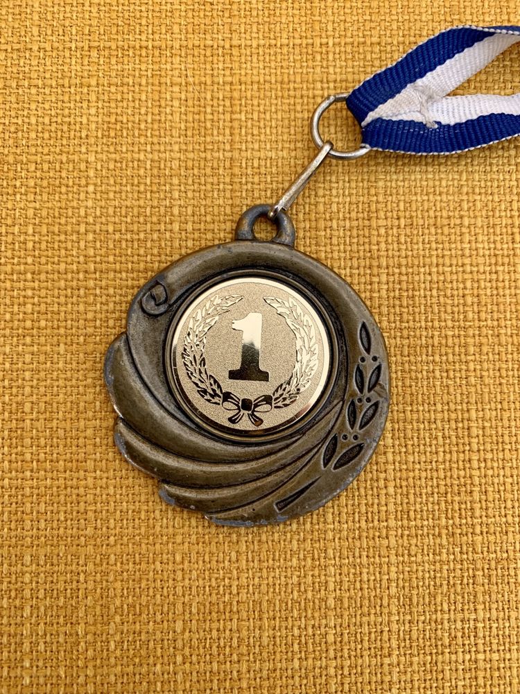 Medalha de 1.º lugar