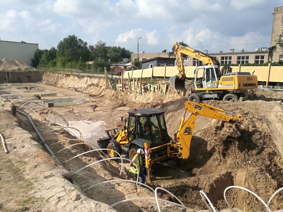 Usługi koparką wywrotką koparko ładowarka wynajem wykopy transport.