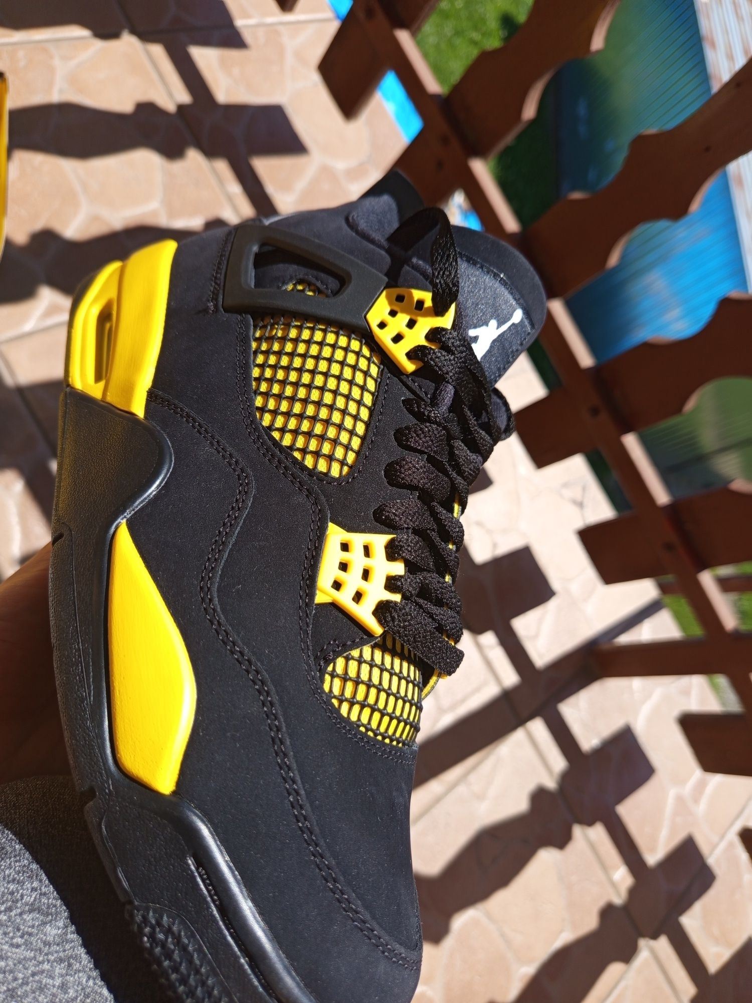 Jordan 4 Yellow Thunder