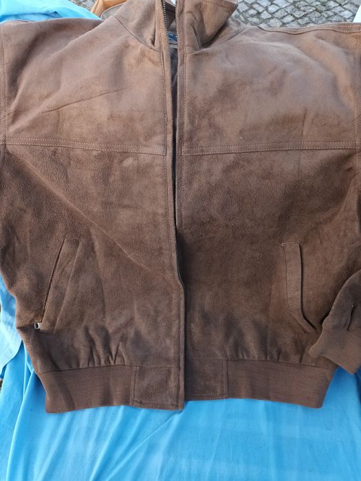 Blusão de homem em estado novo