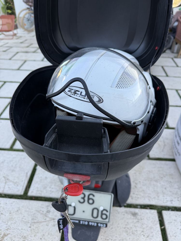 Piaggio Fly 125 com top case