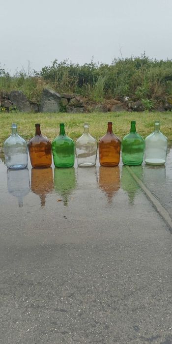 Garrafões antigos em vidro