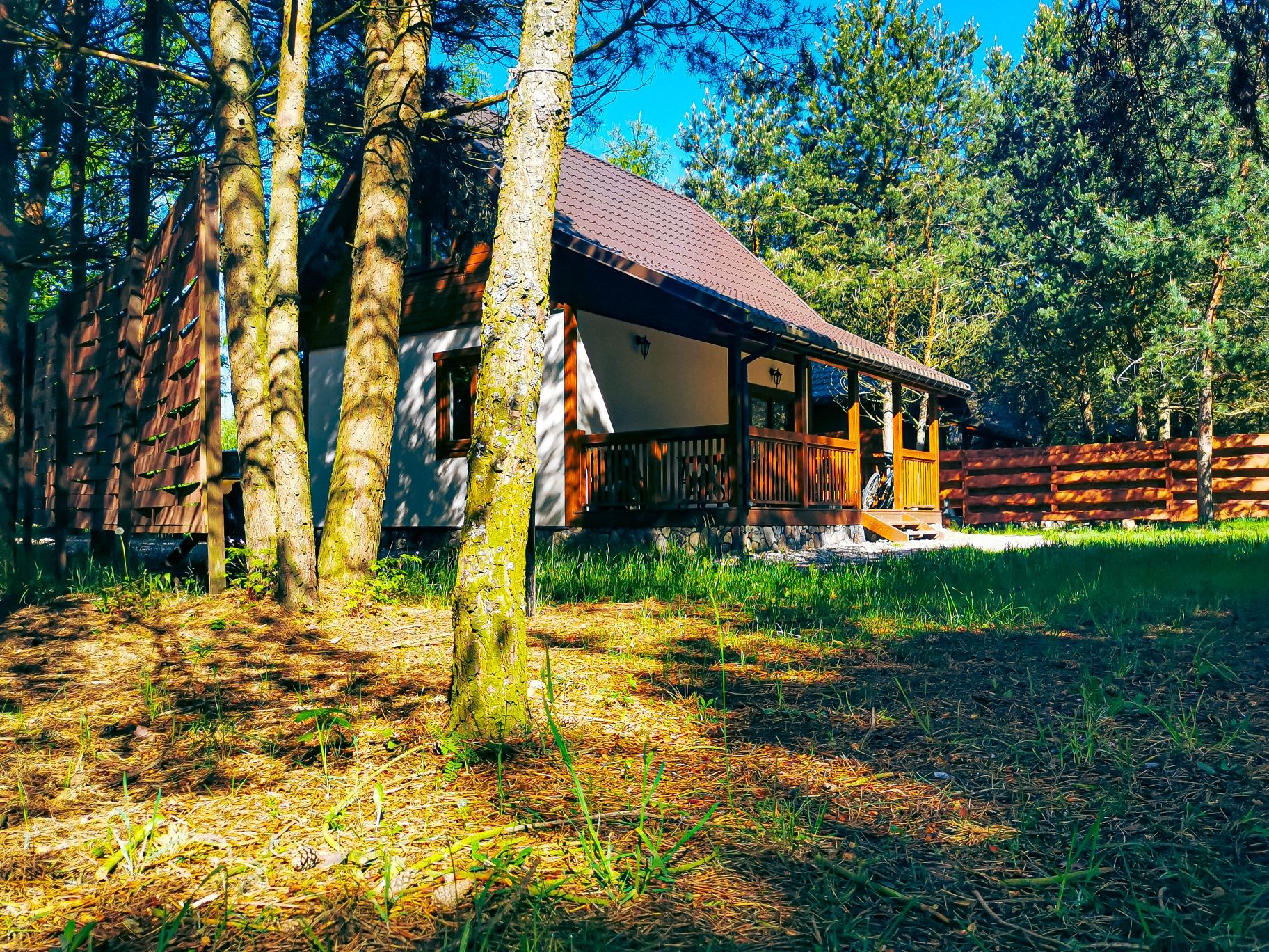 Dom linia brzegowa bania jacuzzi sup Mazury łódka kominek plaża Grill
