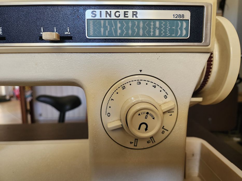 Singer máquina de costura avariada