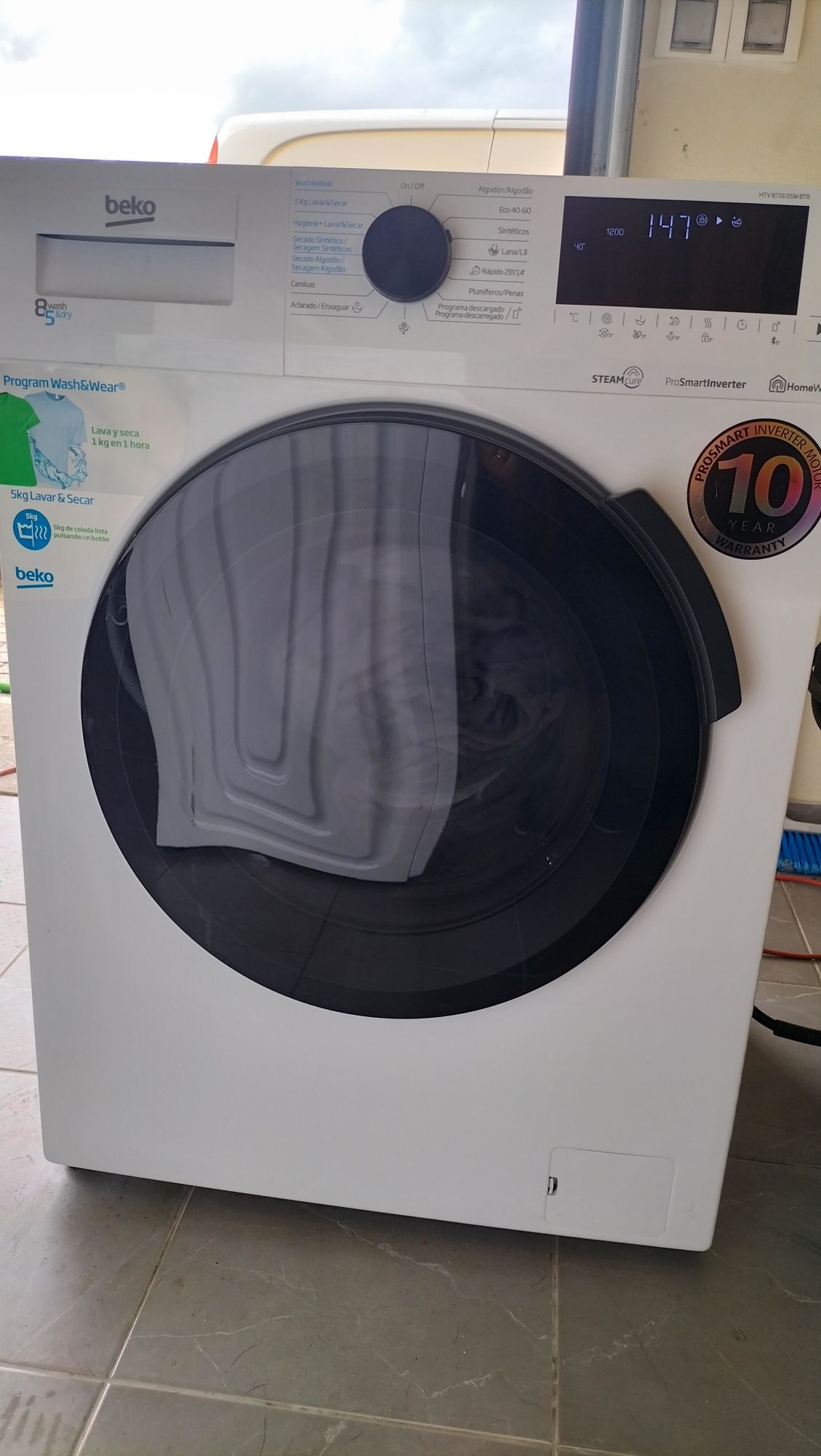 Máquina de lavar e secar