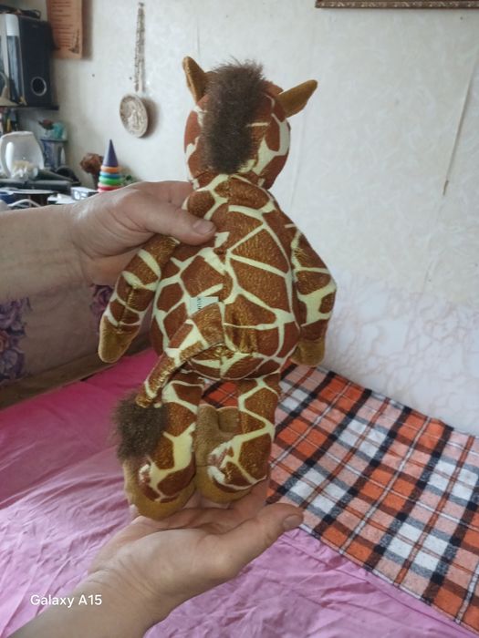 Продам жирафа игрушку