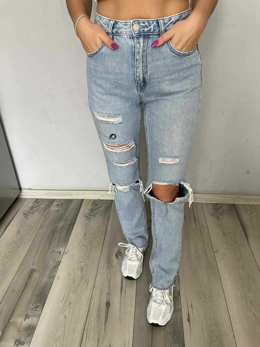 Spodnie jeansowe dżinsowe dżinsy jeansy niebieskie z dziurami straight