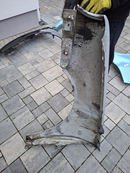 Vw golf 4 iv blotnik przedni prawy srebrny la7w