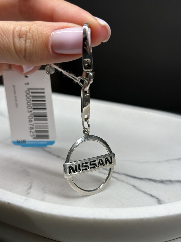 Nissan брелок 925 пробы серебро