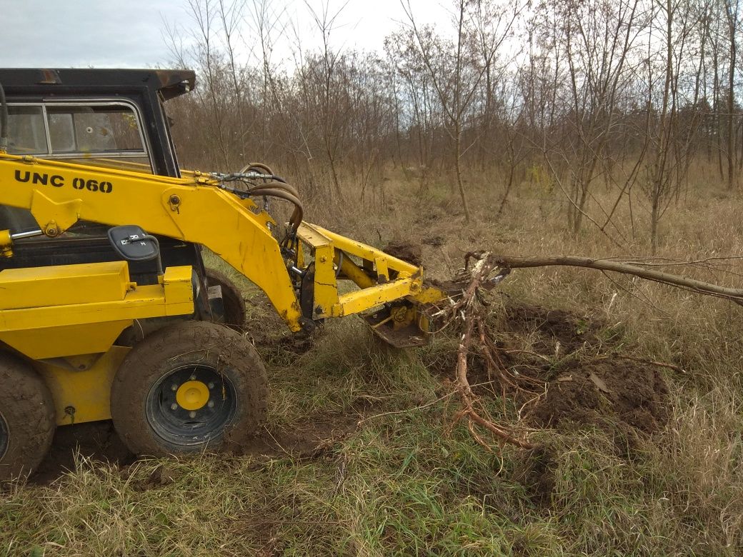 UNC 060 bobcat Корчувач пнів, Корчуватіль, корчування дерев