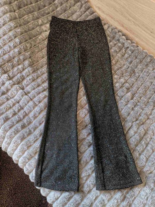 Блискучі штани кльош (sinsay)