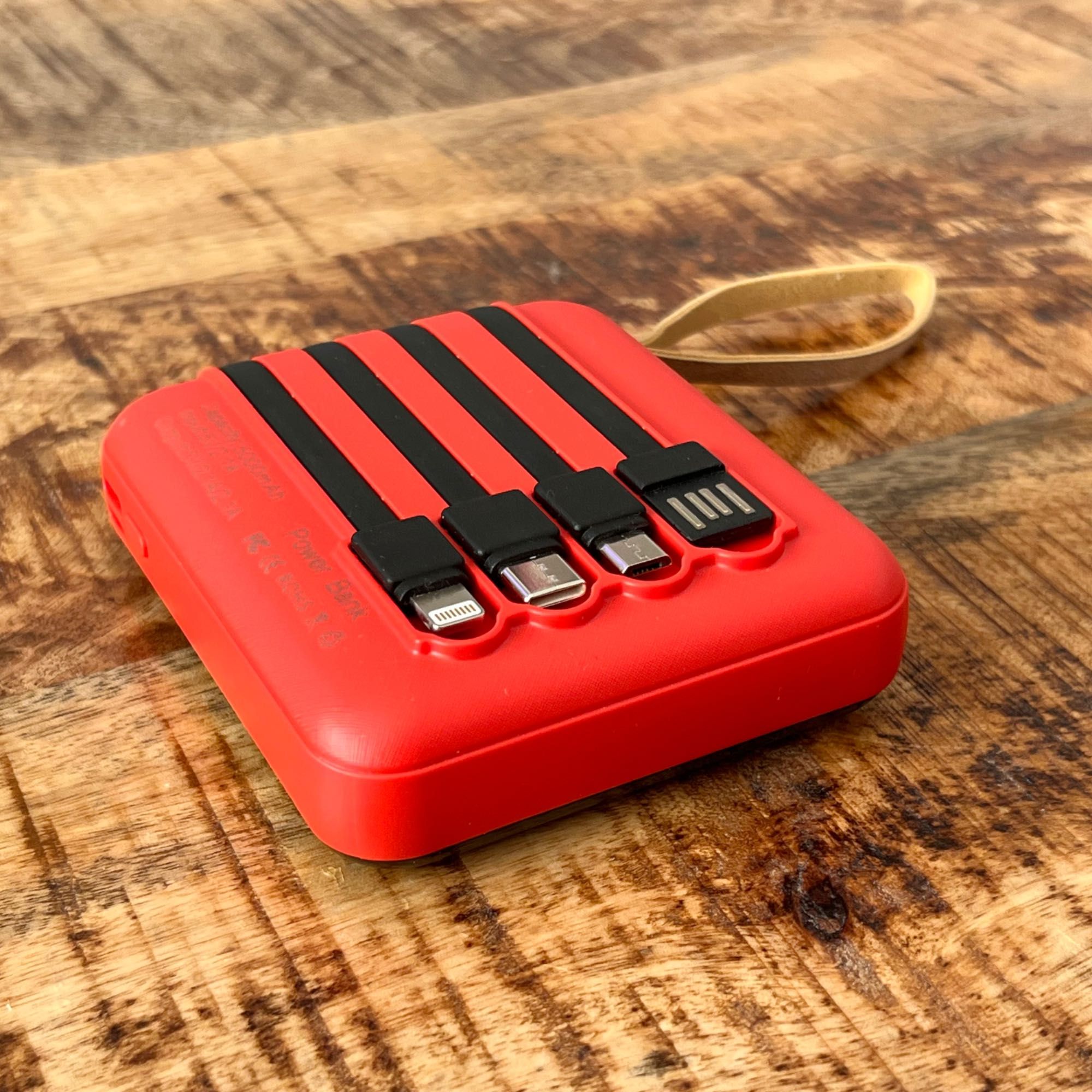 Mini powerbank 5000 mAh, z 4 wbudowanymi kablami USB-C, microUSB...