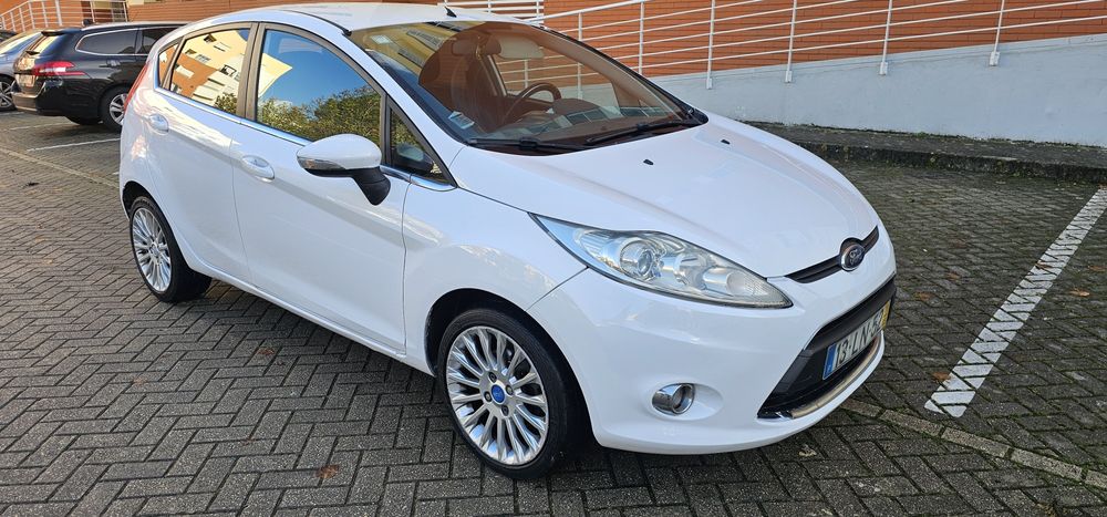 Ford fiesta 1.5 tdci como novo 11