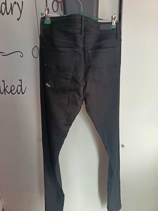 Calças de ganga como novas