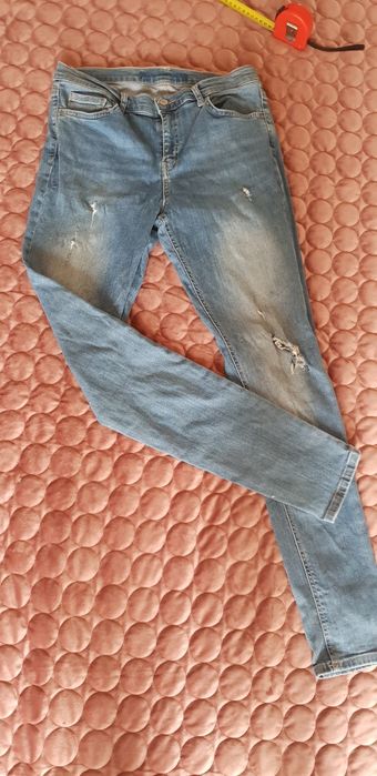 Jeansy z przetarciami r. 40/42