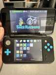 Nintendo 2DS XL niebiesko-czarna , ładowarka , gra