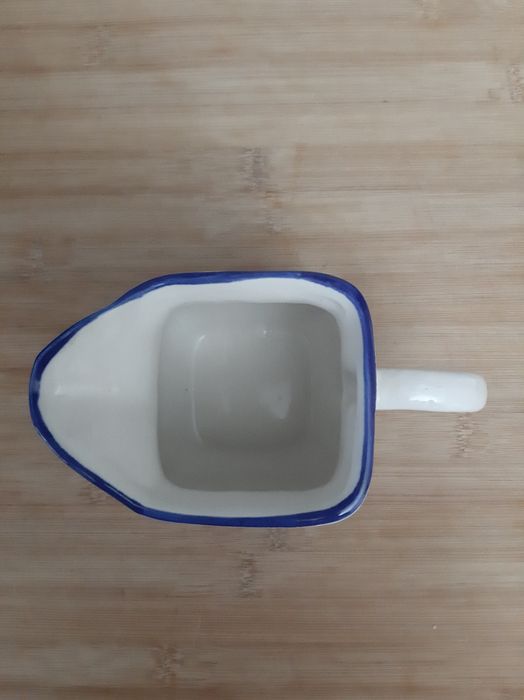 Leiteira em cerâmica