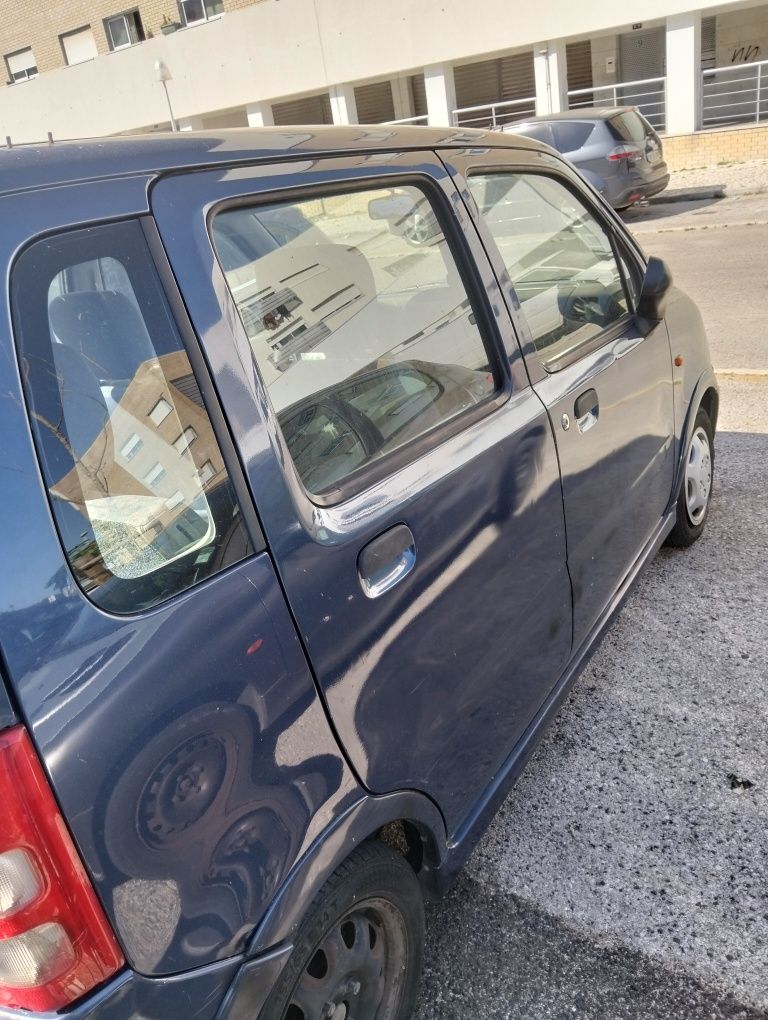 Suzuki wagon r+.
