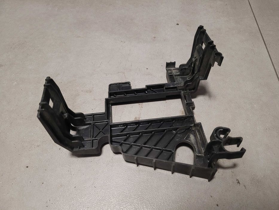 Uchwyt mocowanie skrzynki bezpieczników Skoda Citigo 1S0.915.345