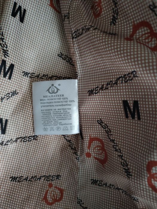 Зимовий пуховик куртка