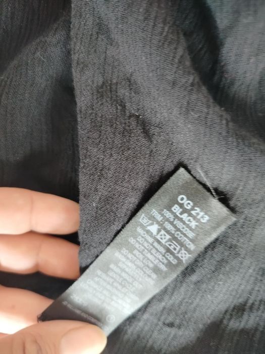 Czarny elastyczny kombinezon z szerokimi nogawkami plus size