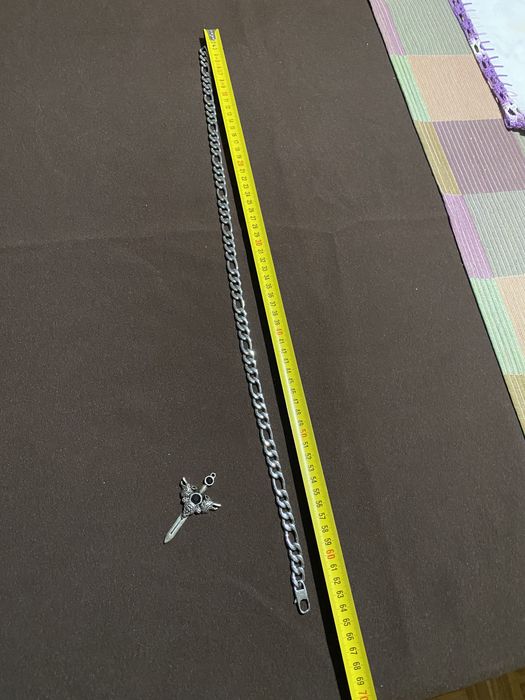 Volta em aço com Cruz