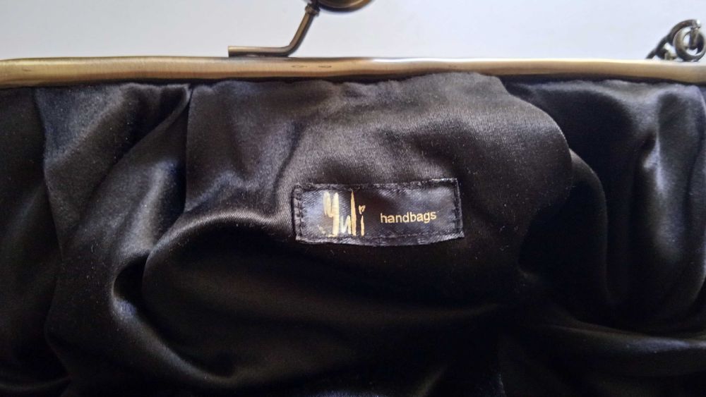 Женская кожаная сумка-клатч бренд Mili Handbags.