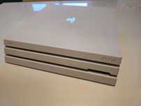 PS4 Pro 1Tb + 2 pady + stacja ładująca