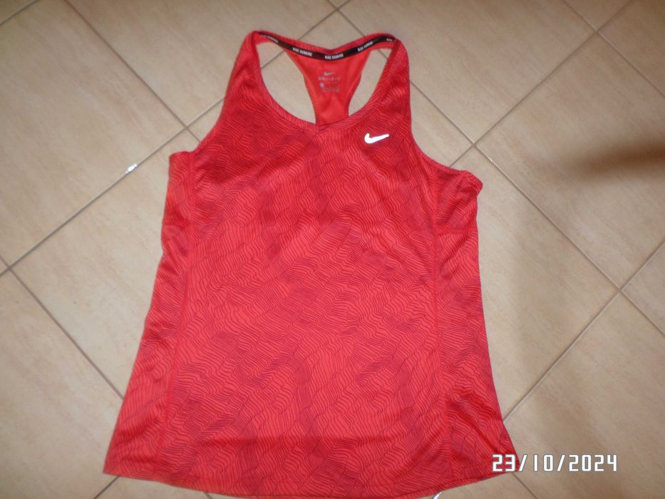 Sprzedam koszulkę sportową marki Nike-L-38/40