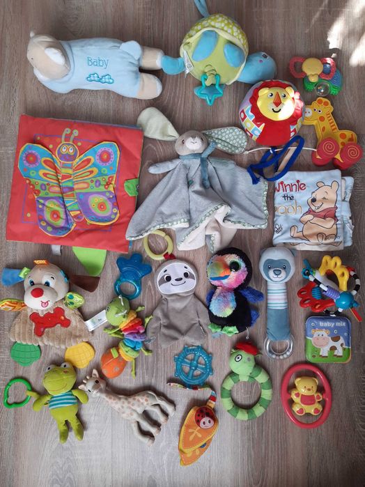 Zabawki dla niemowląt gryzaki grzechotki książeczki pozytywka