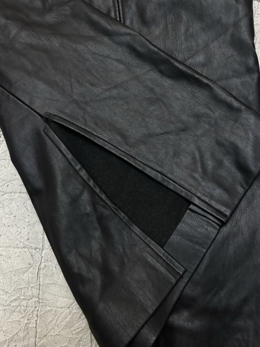 Щкіряна спідниця по коліно