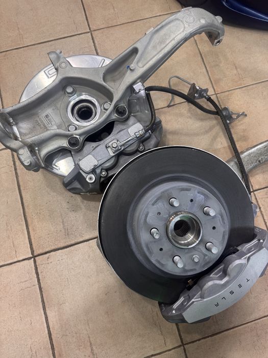 Поворотный кулак царфа tesla model 3