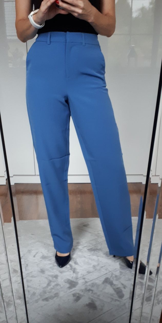 Spodnie damskie materiałowe niebieskie z szerokimi nogawkami XS/S