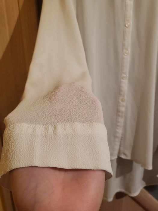 Biała koszula asymetryczna