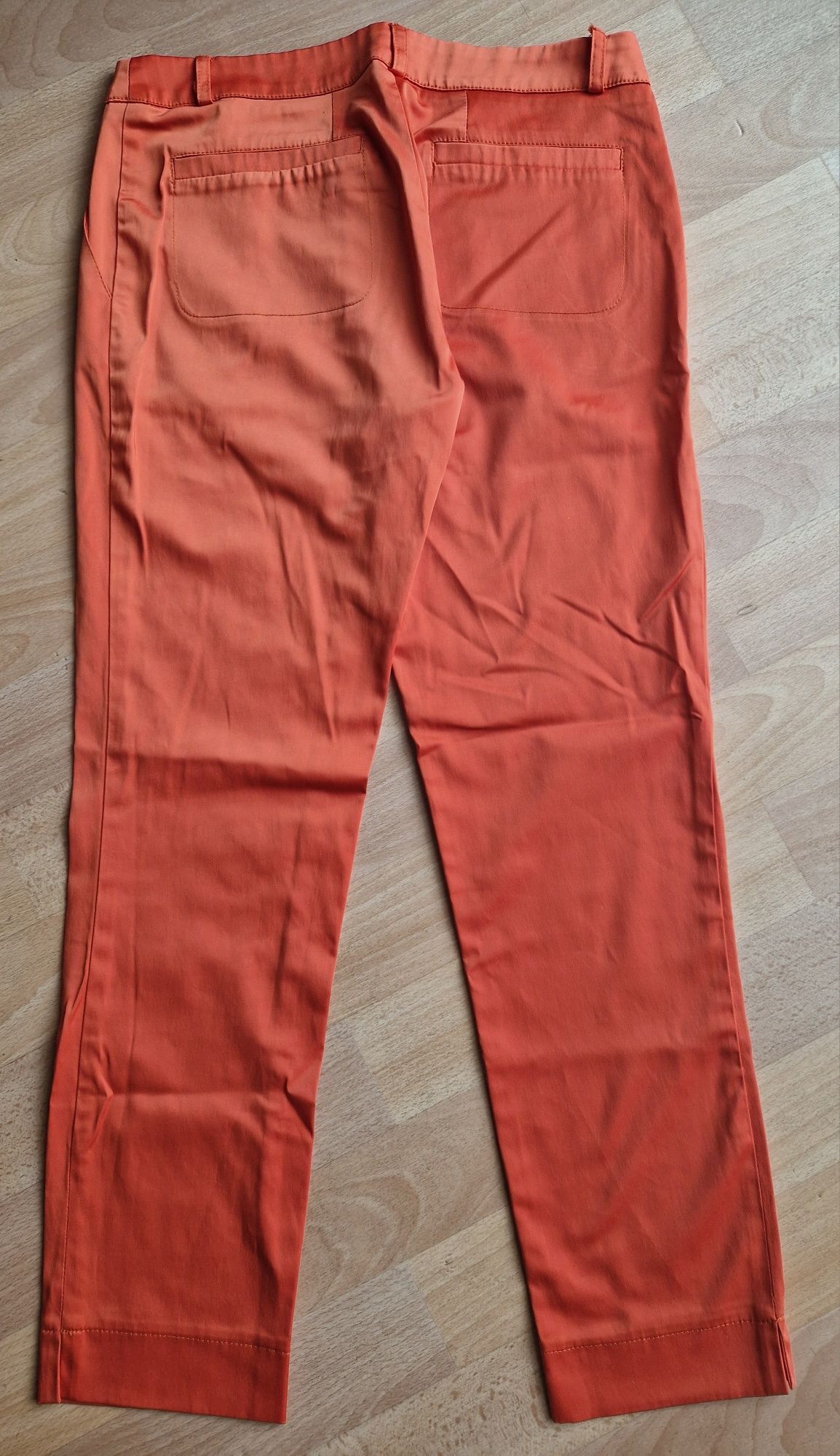 Pomarańczowe spodnie 34