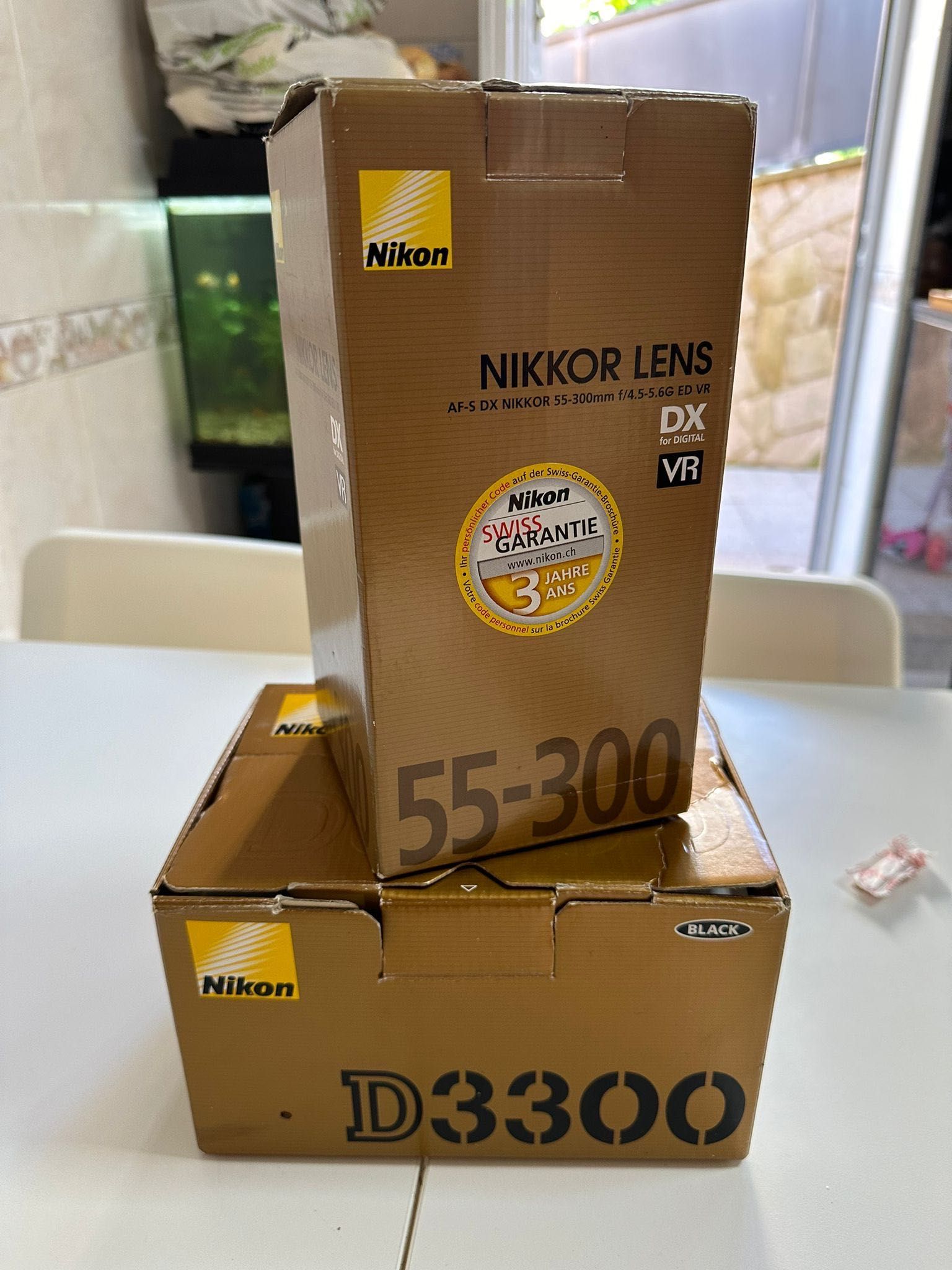 Máquina fotográfica nikon mais objetiva