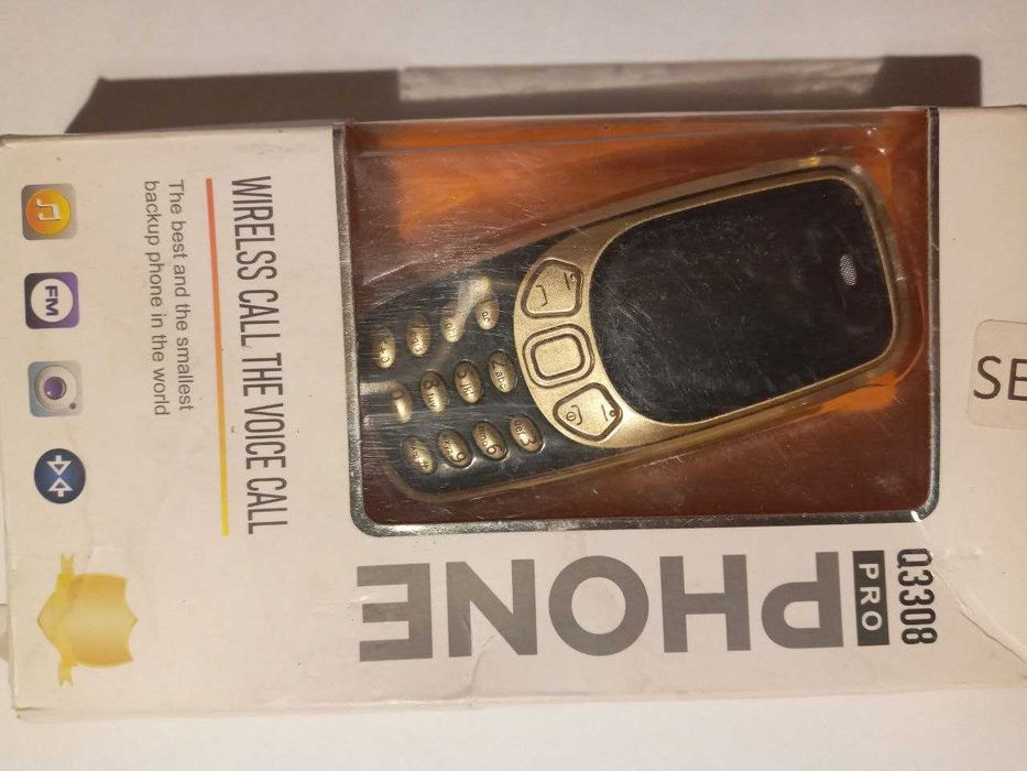 Кнопочный мини телефон на 3 сим.