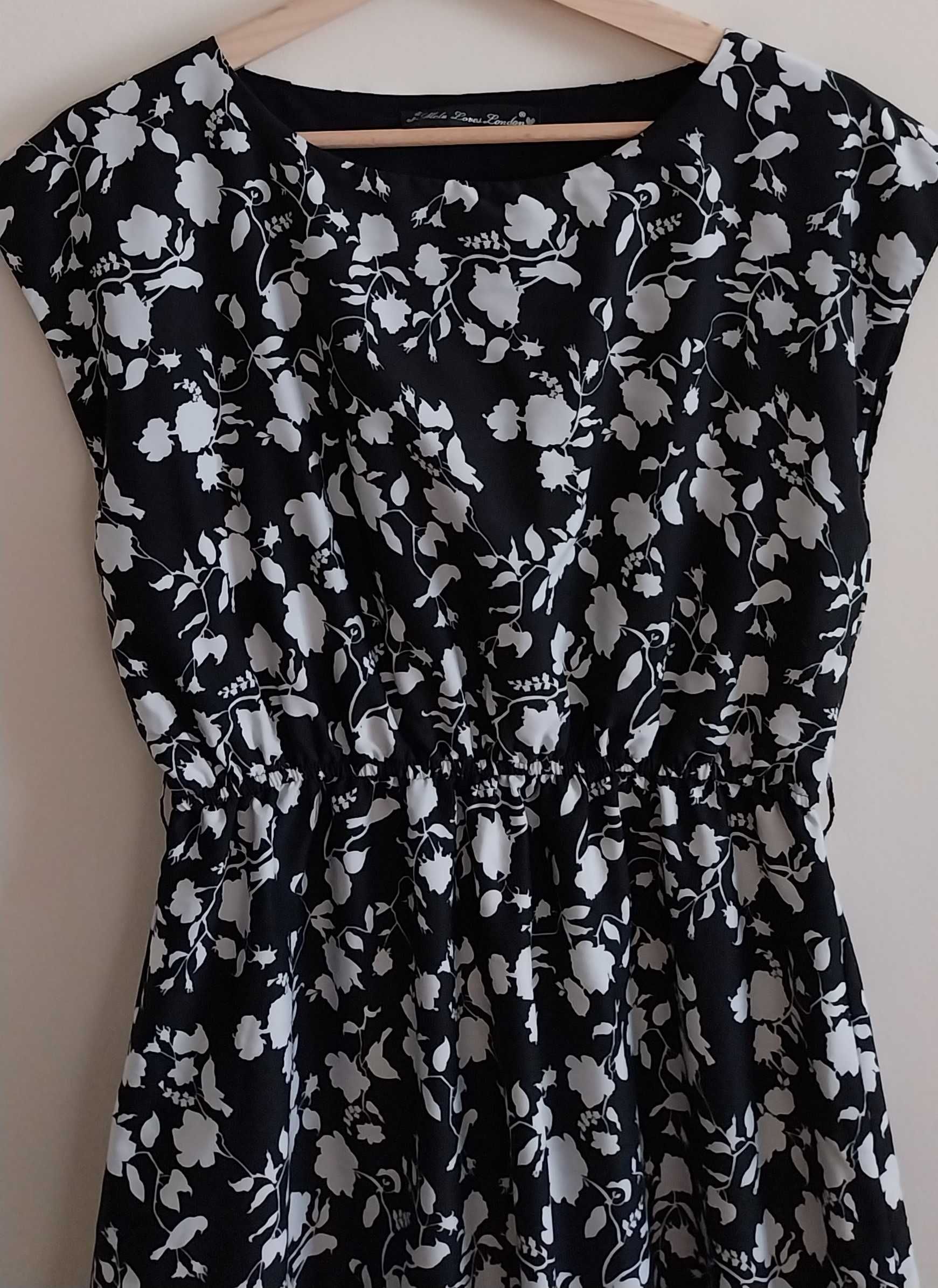 Elegancka sukienka na lato rozkloszowana czarna M/38 S/M kwiaty