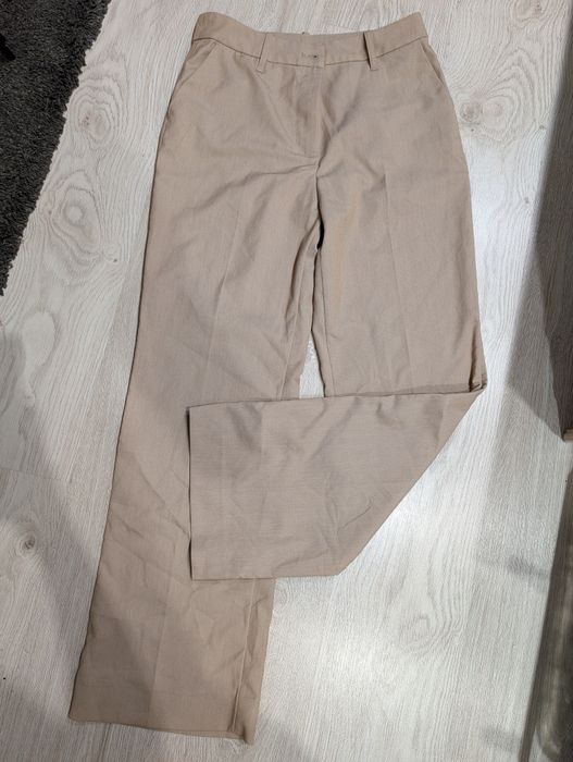 Eleganckie spodnie z szerokimi nogawkami Monki