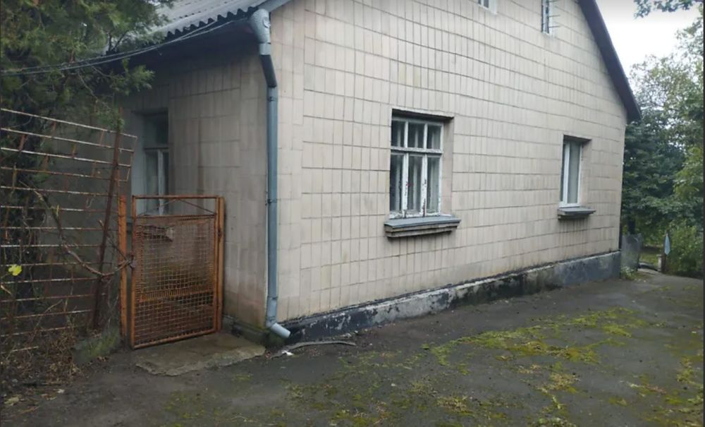 "1/2 частина будинку   з ділянкою і гаражем