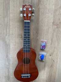 Nowe ukulele sopranowe. Kolor brąz drewno. Gratisy