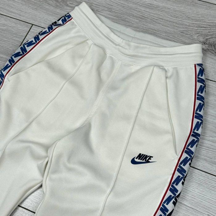 Спортивные штаны Nike Taped Pants спортивні штани найк теч фліс tech