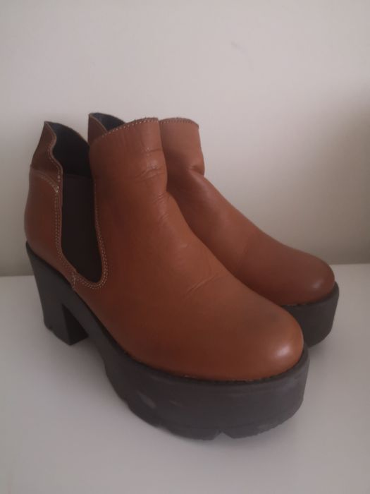 Botas de inverno em pele