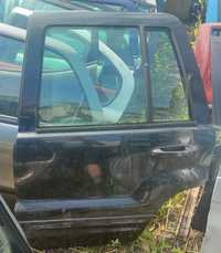Jeep Grand Cherokee WJ tylne lewe drzwi
