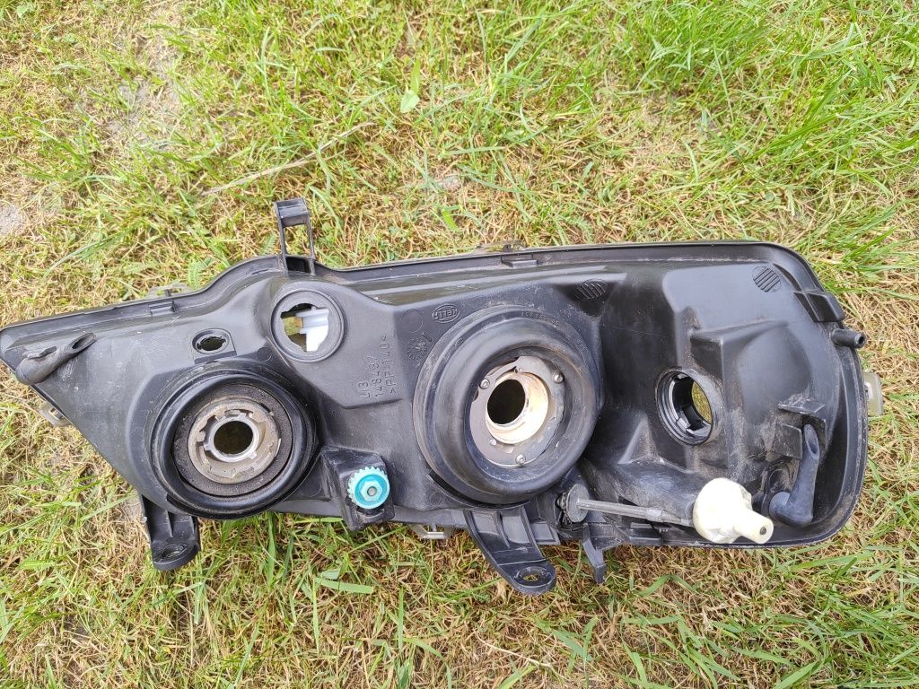 Lewy reflektor opel astra II g