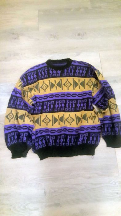 Cieply kolorowy sweter damski