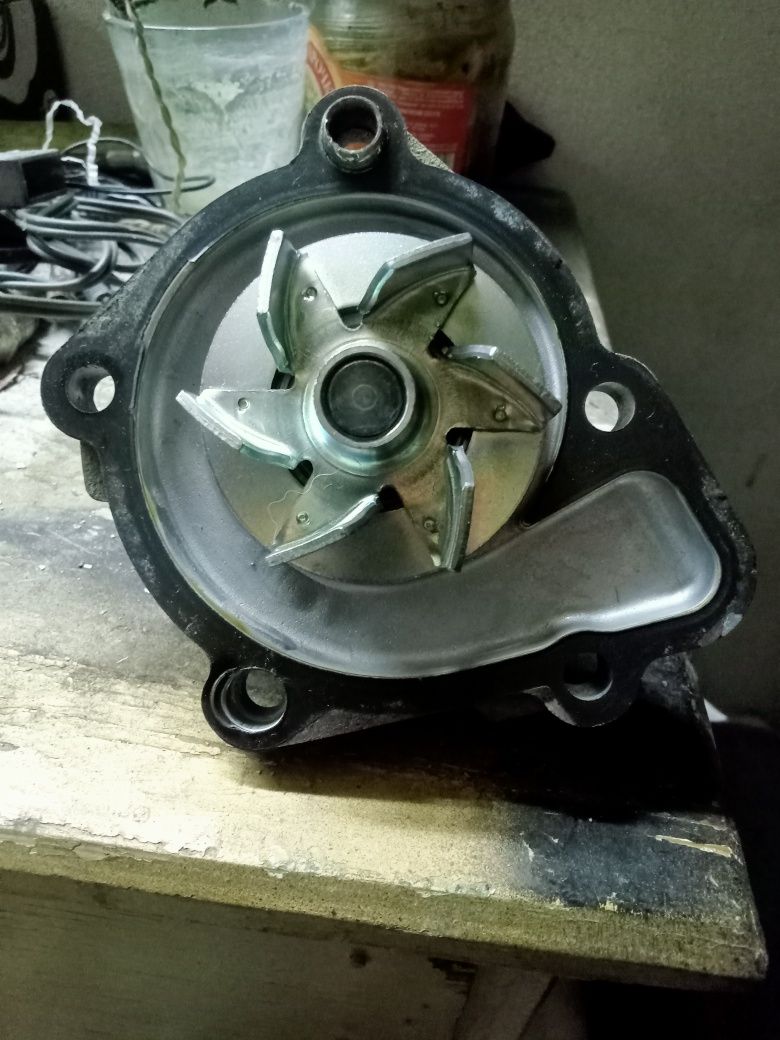 Помпа Mitsubishi Outlander XL 2,4