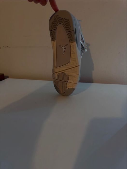 Jordan 4 Frozen Moments