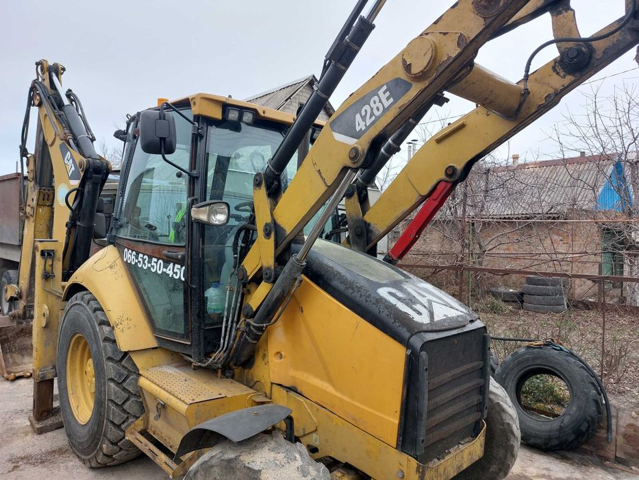 Екскаватор навантажувач